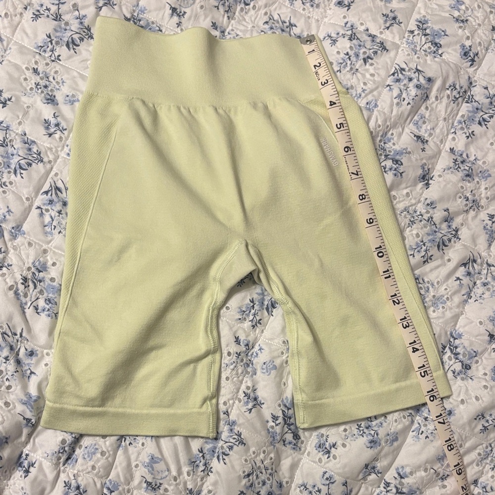 Gymshark High-Waist Athletic Biker Shorts in Pale Yellow